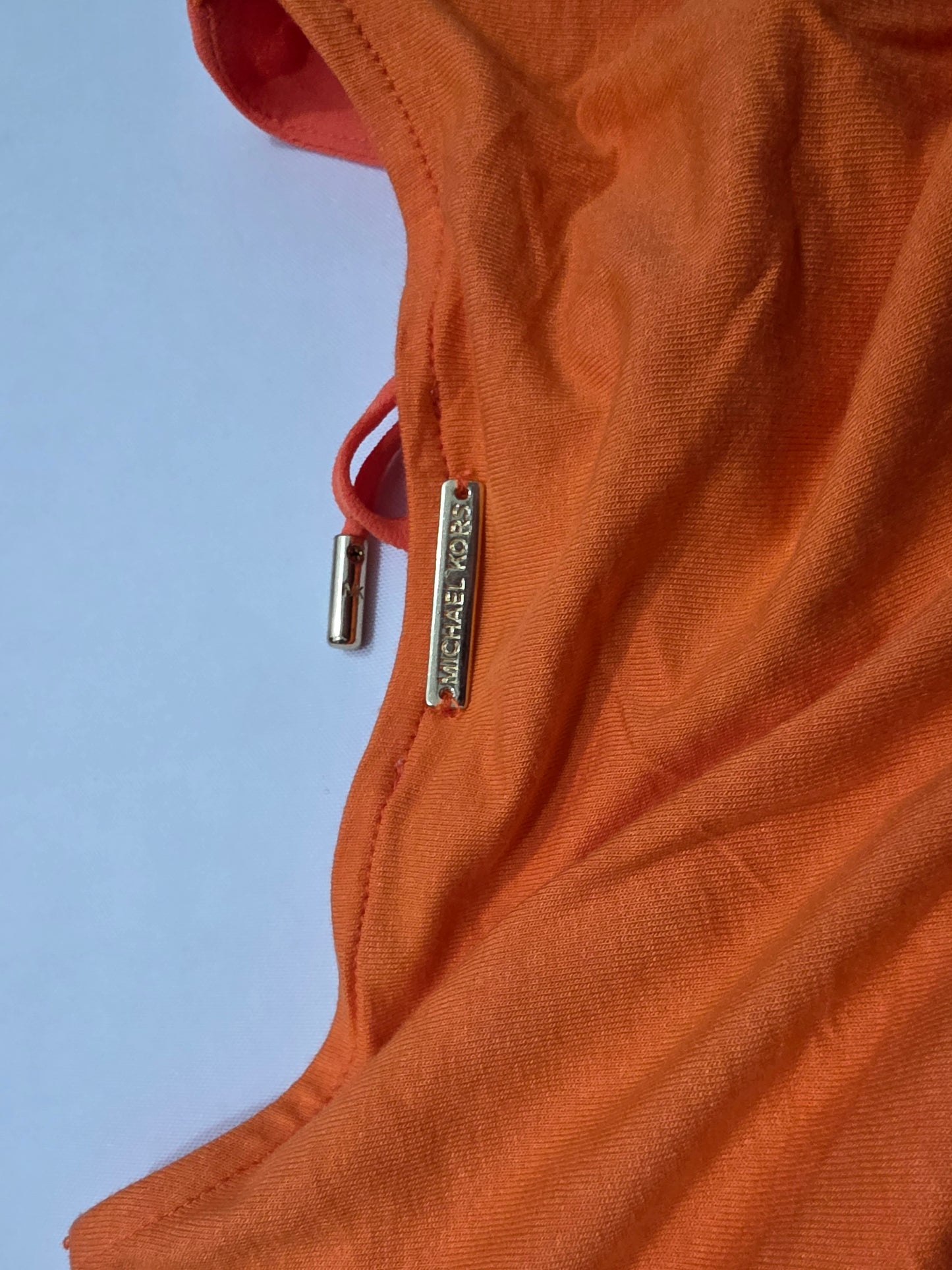 Blusa Michael Kors naranja con cordones sin mangas