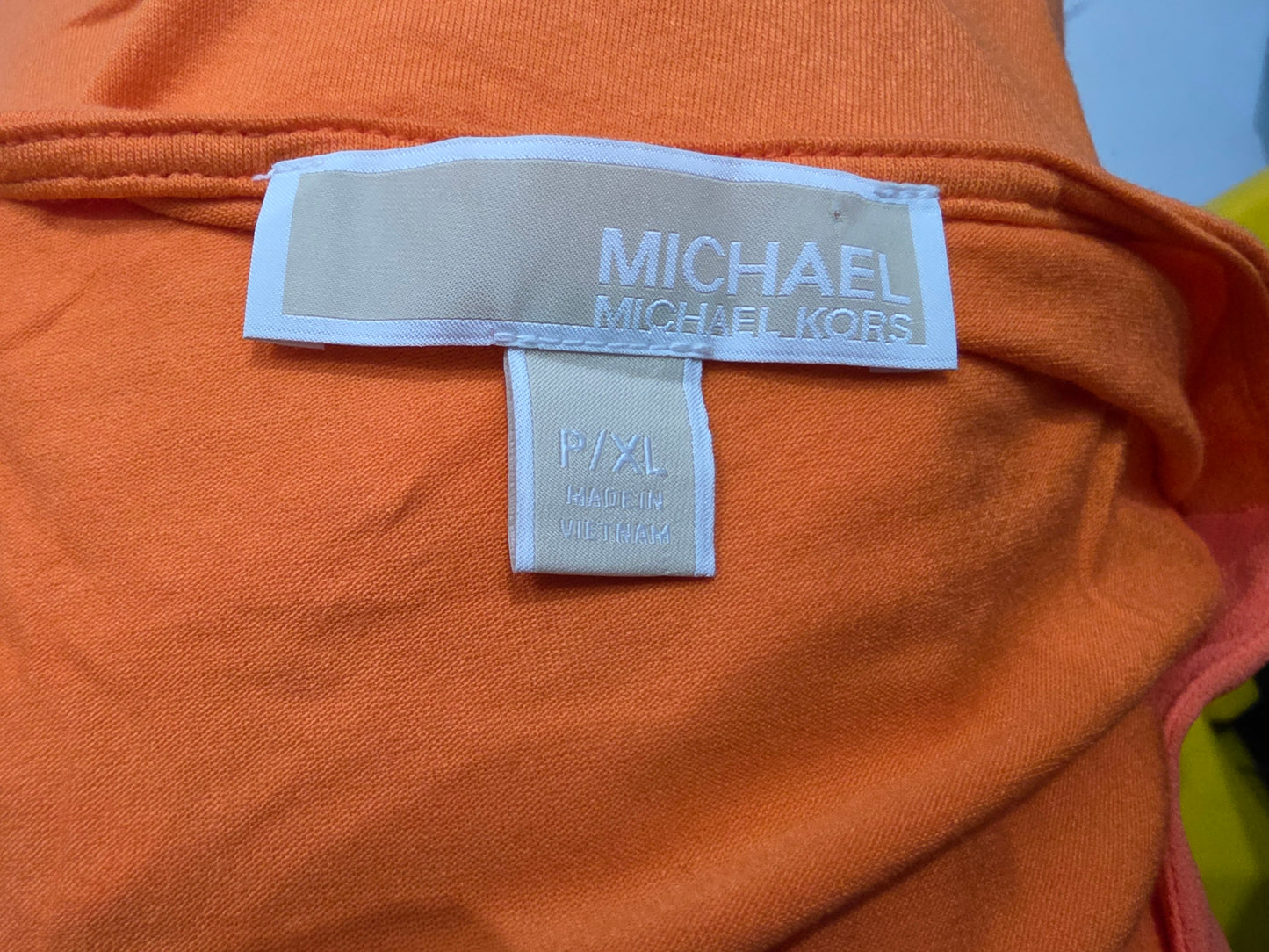 Blusa Michael Kors naranja con cordones sin mangas